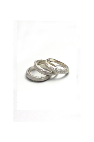 raw texture natural silver stocking ring bend by lacuna jewelry