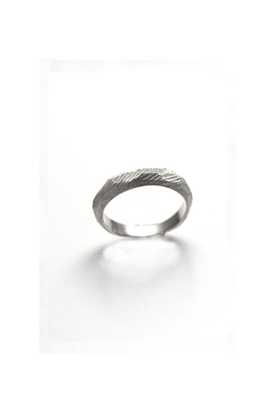 raw texture natural silver stocking ring bend by lacuna jewelry