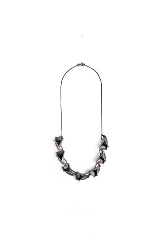 unique contemporary handmade statement necklace made of oxidized sterling silver inspired by nature ocean  made by lacuna jewelry