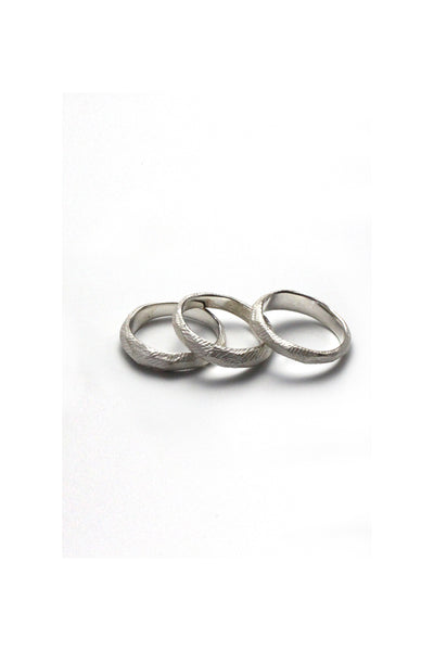 raw texture natural silver stocking ring bend by lacuna jewelry