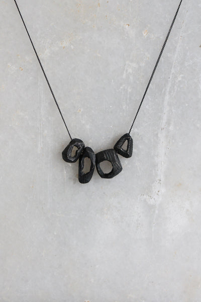raw unique oxidized sterling silver pendant necklace by lacuna jewelry