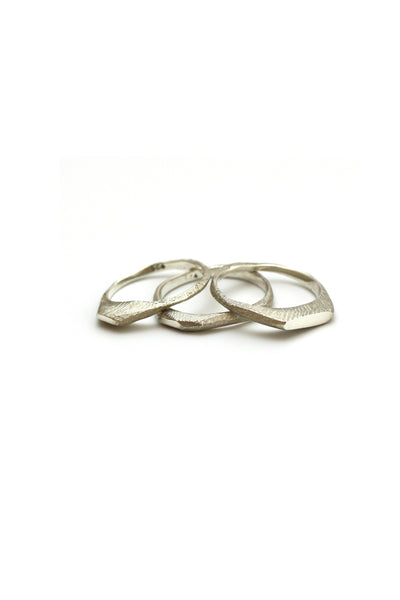 dainty raw silver 3 stoking rings by lacuna jewelry