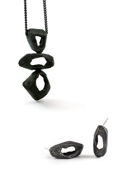 black oxidized silver set of stud earrings and pendant necklace by lacuna jewelry